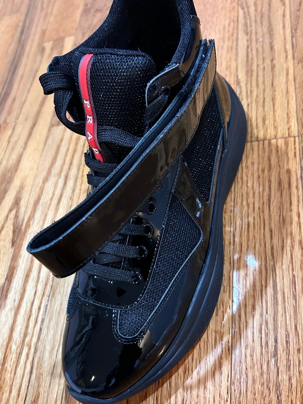 Prada Black High-Top Sneaker with Red Logo Stripe - Picture 4 of 7